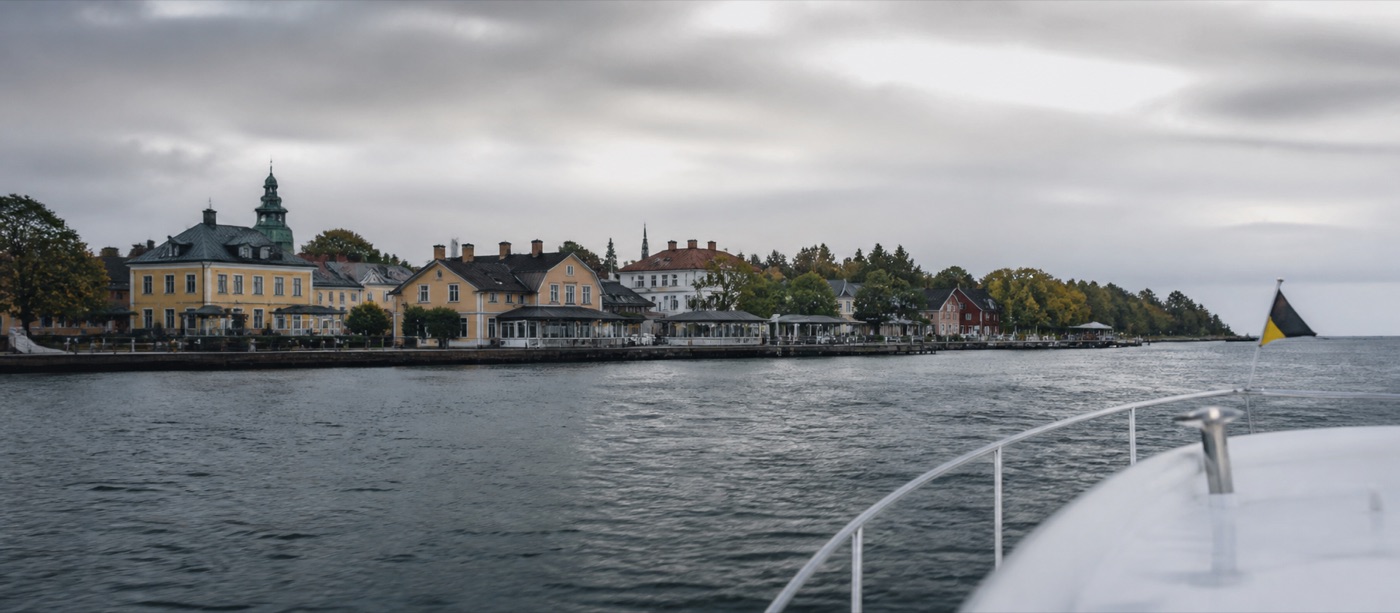 Vaxholm waterfront beneath a grey Stockholm sky