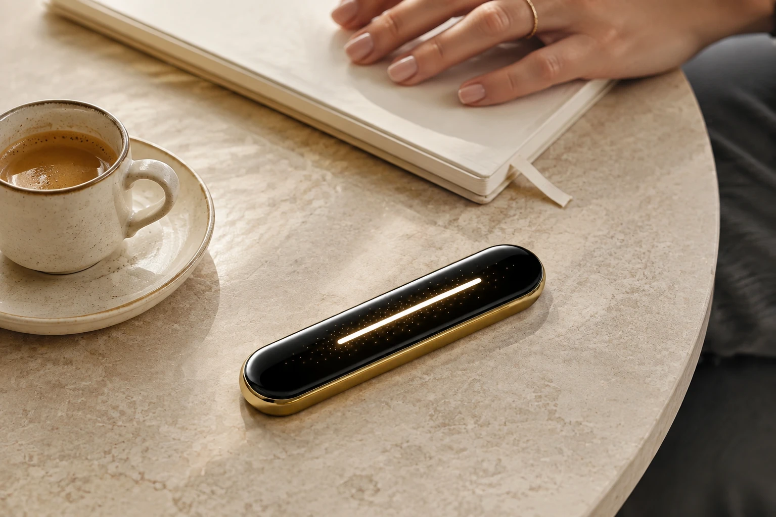AI-generated V5.2 glossy black front with gold rim beside coffee and a notebook