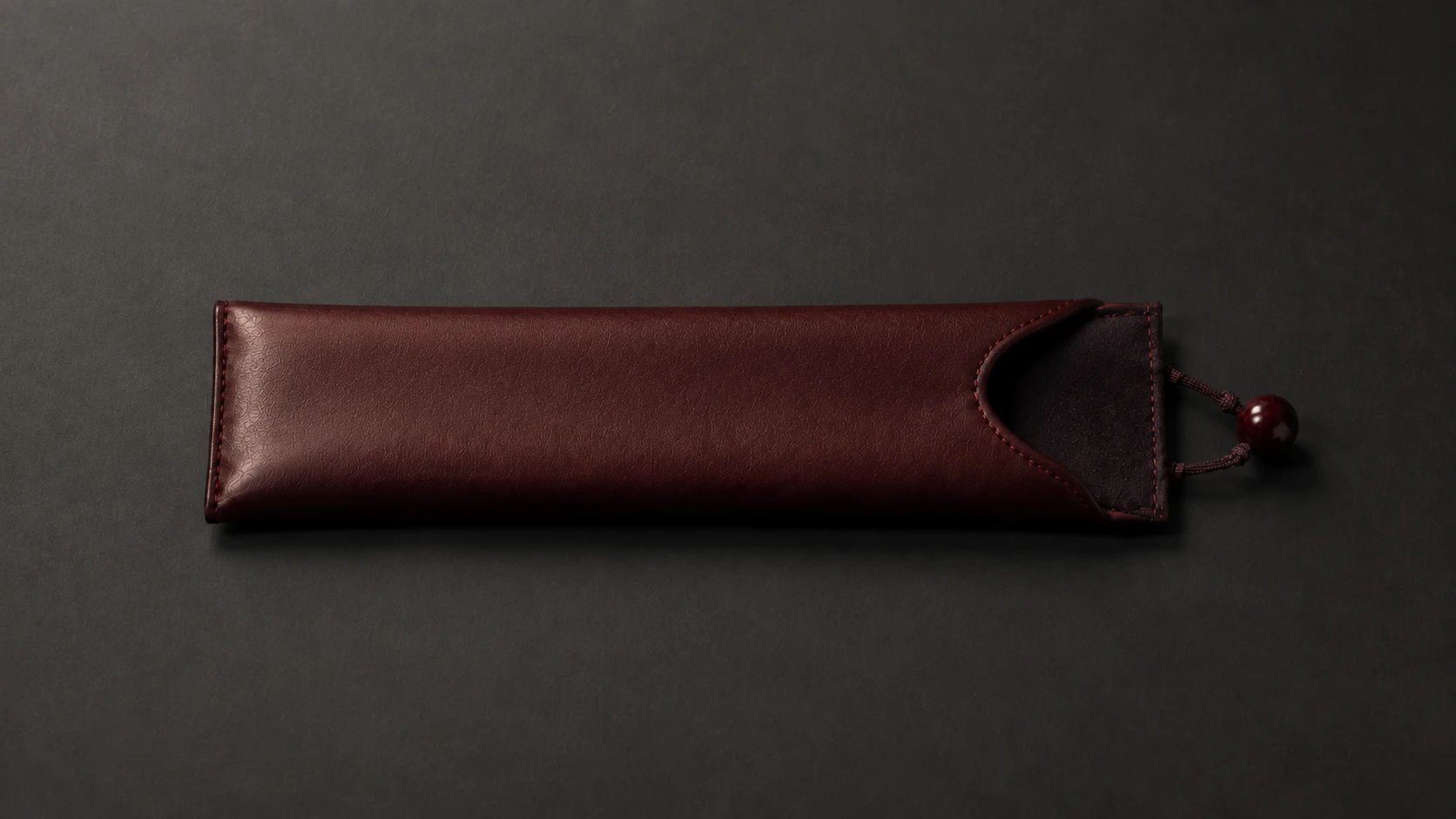 Oxblood Sleeve SAINT design-intent accessory study