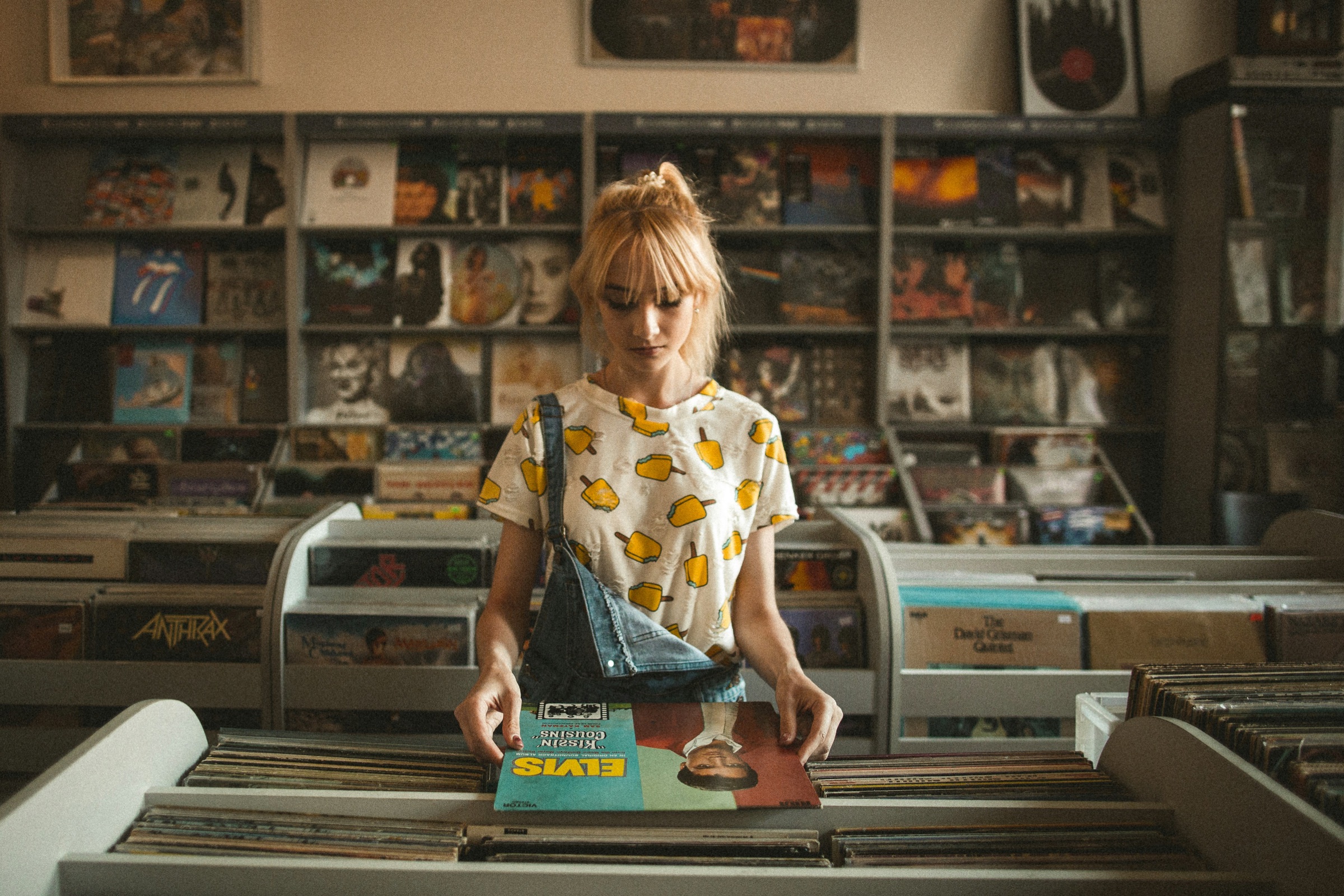 A person choosing a record