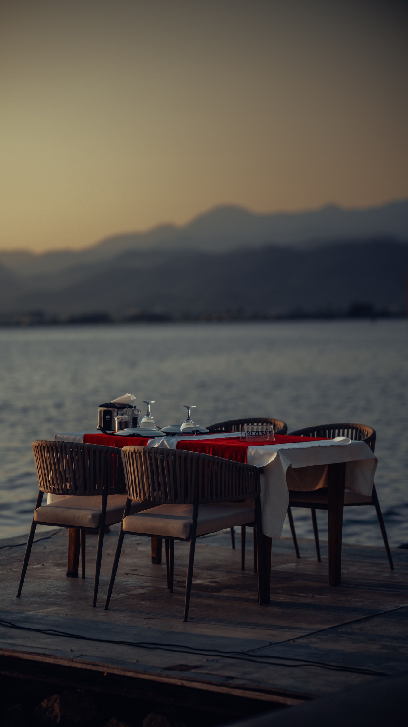 A table set beside the water
